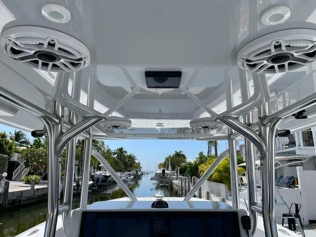  Yacht Photos Pics Interior view of a 2020 Freeman 34VH boat with sleek design and waterfront background.