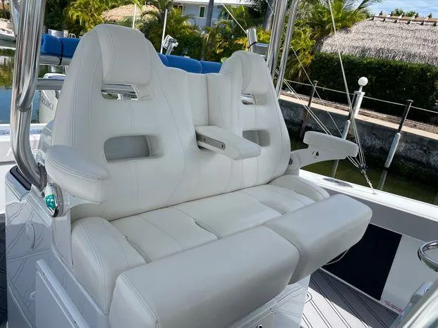  Yacht Photos Pics Luxury seating on a 2020 Freeman 34VH boat, featuring plush white upholstery.