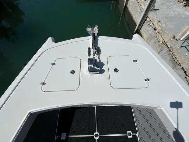  Yacht Photos Pics Bow of 2020 Freeman 34VH boat with anchor and storage hatches.