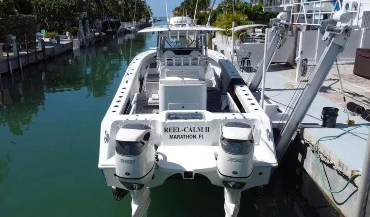  Yacht Photos Pics Freeman 34VH 2020 boat docked in a canal, featuring twin engines.