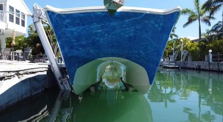  Yacht Photos Pics Freeman 34VH 2020 boat docked in a serene canal setting.