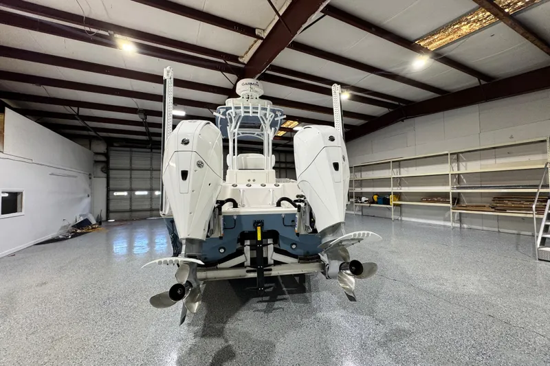  Yacht Photos Pics 2021 Sea Cat 260 boat in a spacious indoor storage facility.