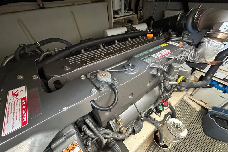  Yacht Photos Pics Engine of a 2005 Sabre 38 boat, showcasing detailed mechanical components.