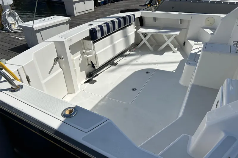  Yacht Photos Pics Spacious deck of a 2005 Sabre 38 boat with seating and storage.