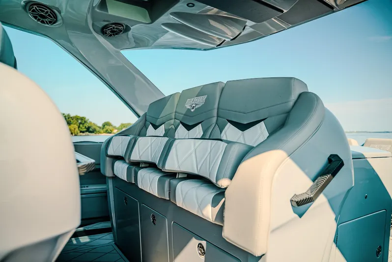  Yacht Photos Pics Interior of 2026 Deep Impact 499 Sport boat with luxurious seating and modern design.