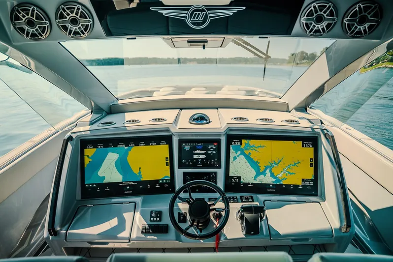  Yacht Photos Pics Cockpit of 2026 Deep Impact 499 Sport boat with advanced navigation displays.