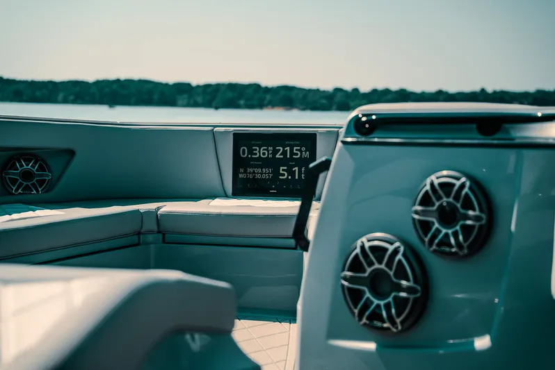  Yacht Photos Pics Interior of 2026 Deep Impact 499 Sport boat with speakers and navigation display.