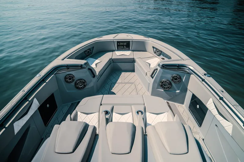  Yacht Photos Pics Luxurious 2026 Deep Impact 499 Sport boat interior with sleek seating and modern design.