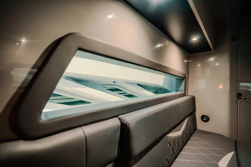 Yacht Photos Pics Interior of 2026 Deep Impact 499 Sport boat, featuring sleek design and modern seating.