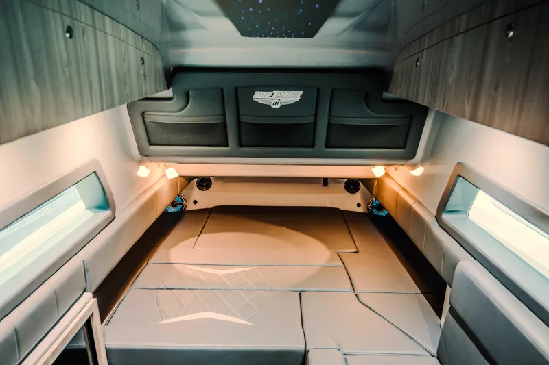  Yacht Photos Pics Luxurious interior of 2026 Deep Impact 499 Sport boat with modern lighting and seating.