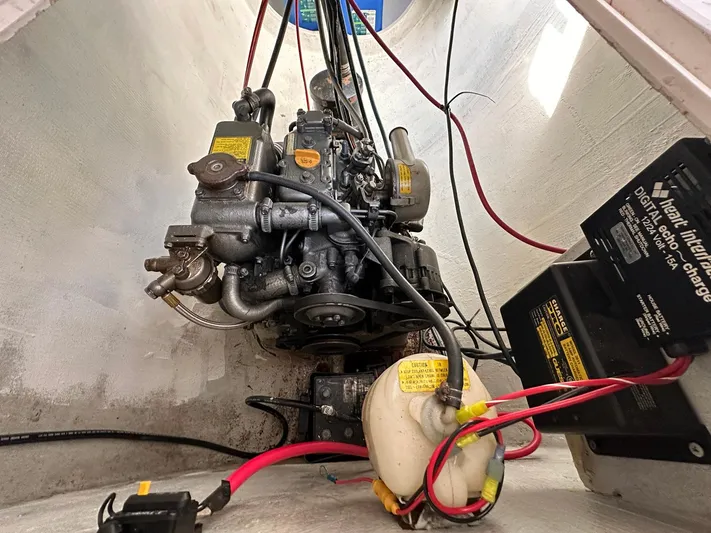 Sola Fide Yacht Photos Pics Engine compartment of a 1993 Russell Yachts Crowther, showcasing mechanical components and wiring.