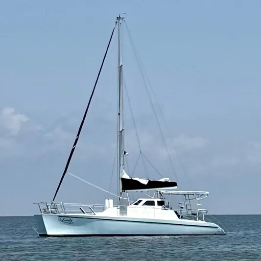 Sola Fide Yacht Photos Pics Sailing yacht on calm sea, 1993 Russell Yachts Crowther model.
