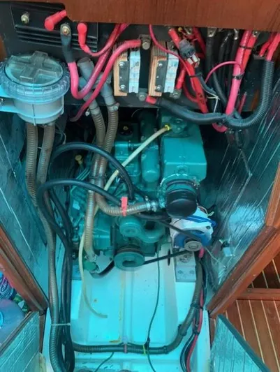  Yacht Photos Pics Engine compartment of a 2002 Jeanneau Sun Odyssey 40 sailboat, showing wiring and components.