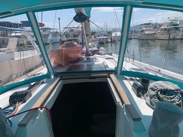  Yacht Photos Pics Jeanneau Sun Odyssey 40 sailboat, 2002 model, docked in a marina with clear skies.