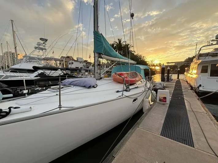  Yacht Photos Pics Jeanneau Sun Odyssey 40 sailboat docked at sunset, 2002 model.