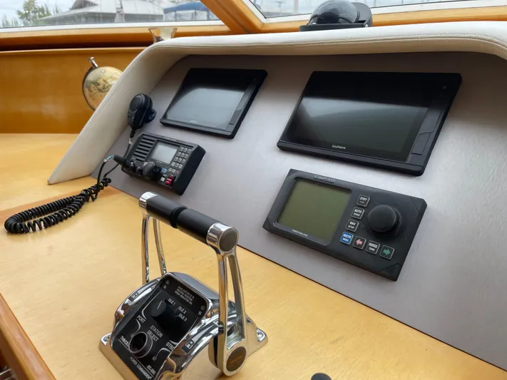  Yacht Photos Pics Control panel of 2000 McKinna 57 Pilothouse yacht with navigation equipment.
