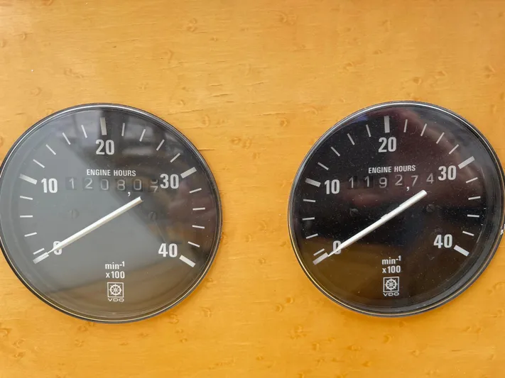  Yacht Photos Pics Engine hour gauges on a 2000 McKinna 57 Pilothouse, showing 1208.0 and 1192.7 hours.