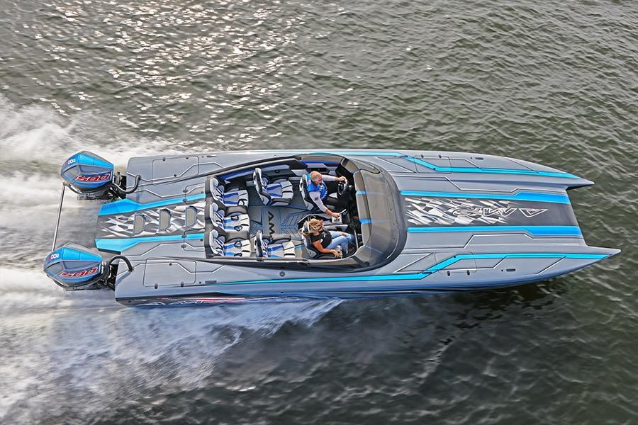 2026 American Marine Performance 393 CAT speedboat cruising on water, featuring sleek design and vibrant colors.