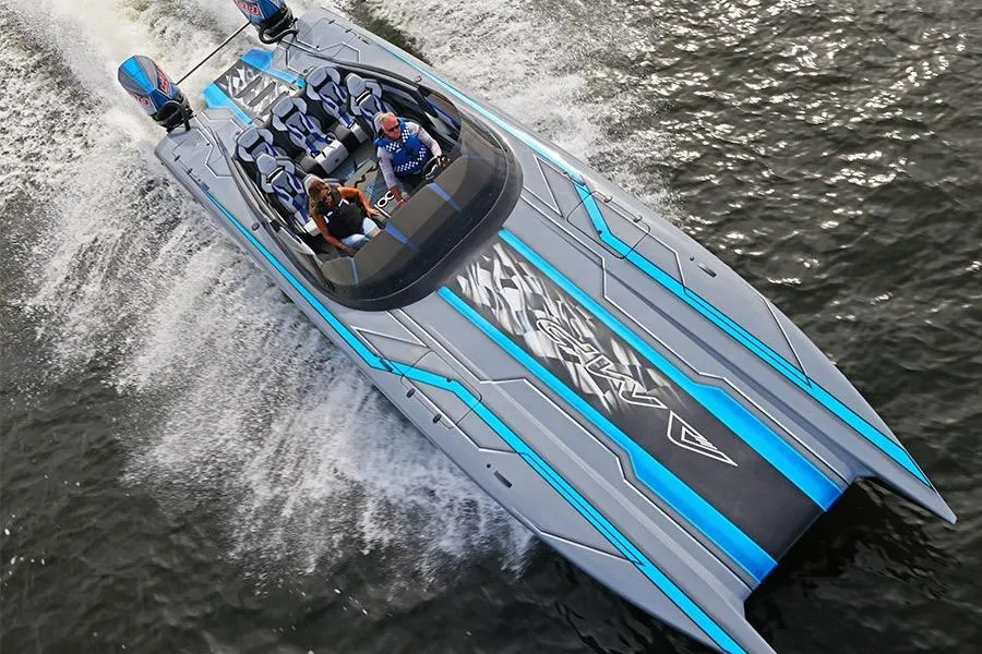 2026 American Marine Performance 393 CAT speedboat on water, featuring sleek design and vibrant blue accents.
