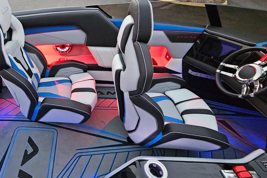Interior of 2026 American Marine Performance 393 CAT with modern seats and ambient lighting.