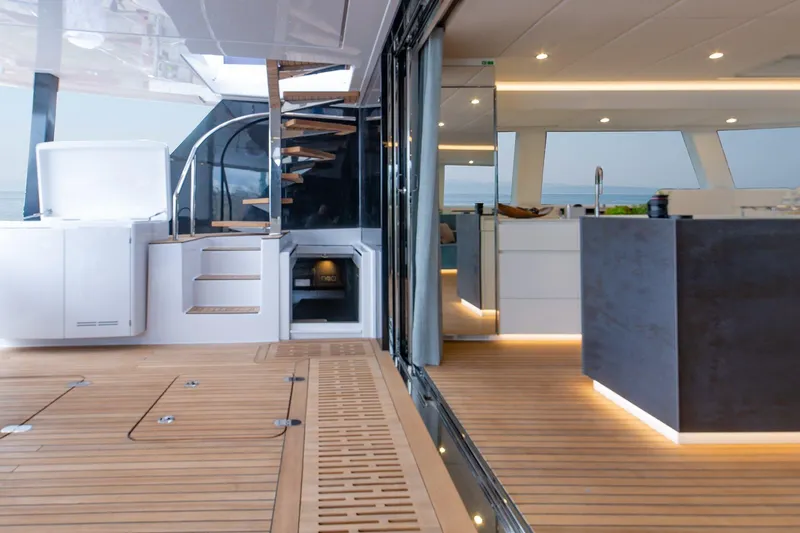  Yacht Photos Pics Luxurious interior of 2026 Sunreef 60 yacht with modern design and wooden flooring.