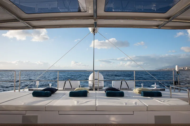  Yacht Photos Pics Luxurious Sunreef 60 yacht deck with ocean view, 2026 model.