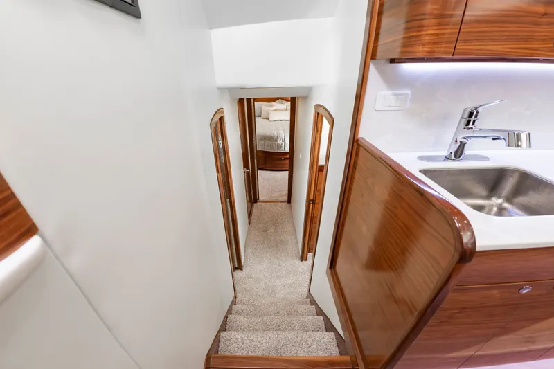 Big Hunter Yacht Photos Pics Interior of 2024 Albemarle Spencer Edition with stairs and kitchen.