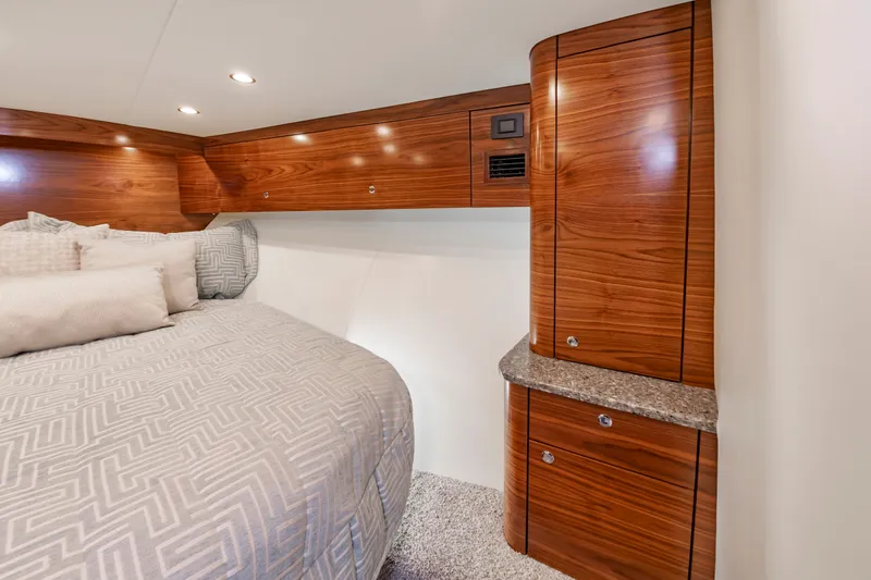 Big Hunter Yacht Photos Pics Luxurious bedroom in the 2024 Albemarle Spencer Edition boat.