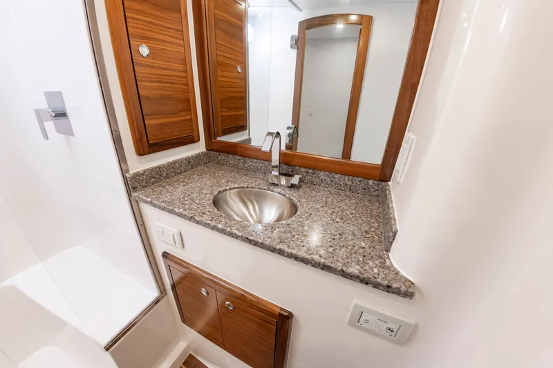 Big Hunter Yacht Photos Pics Luxurious bathroom in the 2024 Albemarle Spencer Edition boat.