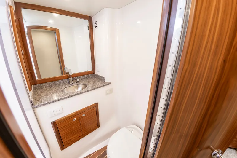 Big Hunter Yacht Photos Pics Luxurious bathroom in the 2024 Albemarle Spencer Edition boat.