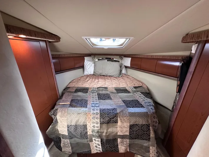 Crash Money Yacht Photos Pics Luxurious cabin interior of 2007 Sea Ray 44 Sundancer yacht with cozy bed.