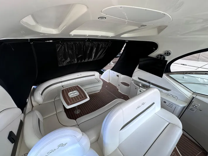 Crash Money Yacht Photos Pics Luxurious 2007 Sea Ray 44 Sundancer yacht interior with elegant seating and modern design.
