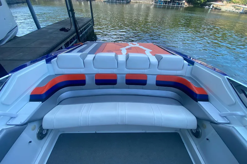  Yacht Photos Pics 2008 Formula 382 FASTech boat interior with colorful seating by the water.