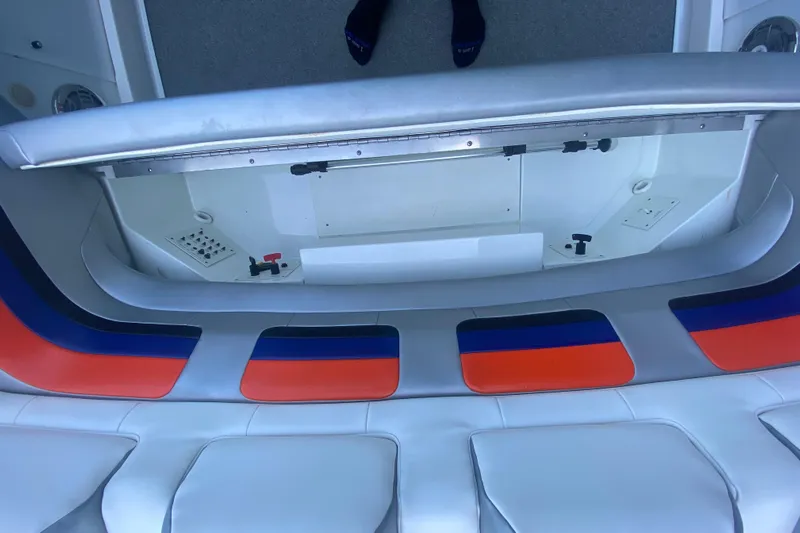  Yacht Photos Pics 2008 Formula 382 FASTech boat interior with colorful seating and storage compartment.