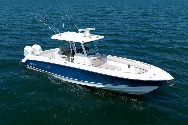 Murphy's Law Yacht Photos Pics 2016 Boston Whaler 330 Outrage boat cruising on open water.