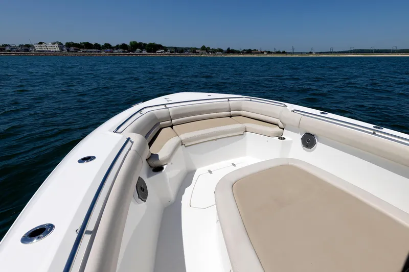 Murphy's Law Yacht Photos Pics 2016 Boston Whaler 330 Outrage boat with spacious seating on calm water.