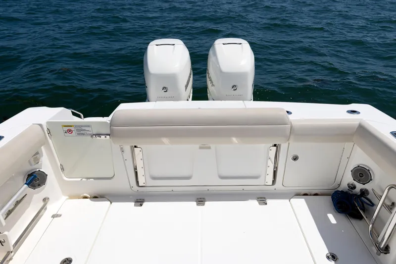 Murphy's Law Yacht Photos Pics Boston Whaler 330 Outrage 2016 boat deck with twin engines on open water.