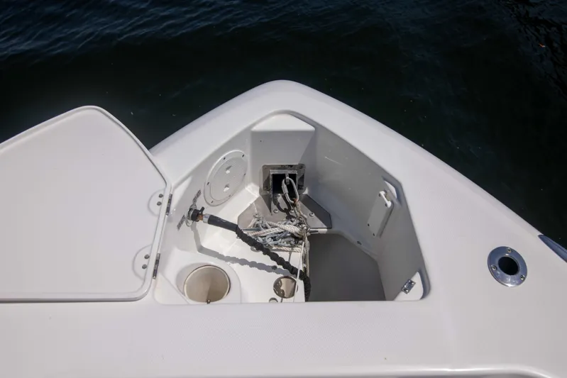 Outta Hand Yacht Photos Pics 2009 Everglades 350CC boat anchor compartment with open hatch.