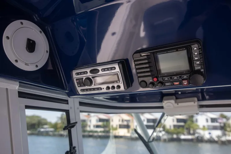 Outta Hand Yacht Photos Pics 2009 Everglades 350CC boat interior with navigation and communication equipment.