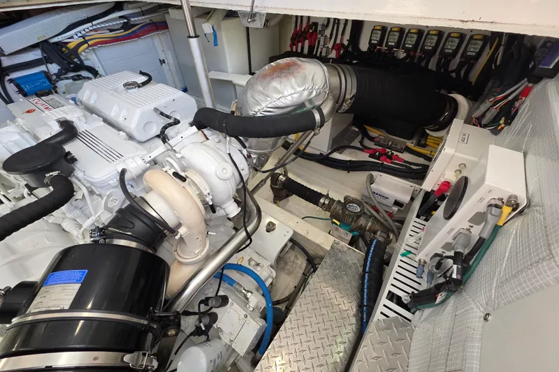  Yacht Photos Pics Engine room of 2022 Back Cove 372 boat, showcasing mechanical components and wiring.