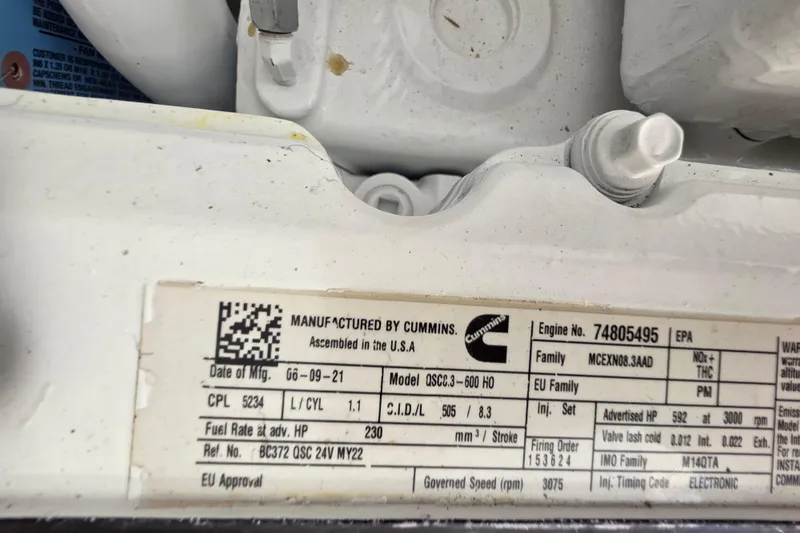  Yacht Photos Pics Cummins engine label on a 2022 Back Cove 372 boat, detailing specifications and manufacturing data.