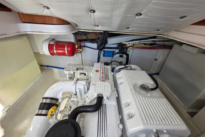  Yacht Photos Pics Engine room of 2022 Back Cove 372 boat with visible fire extinguisher and wiring.