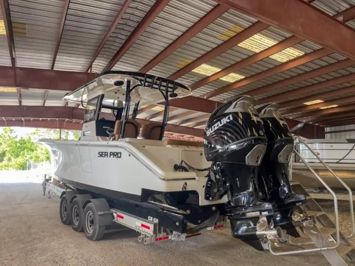  Yacht Photos Pics 2025 Sea Pro 322 Offshore boat with dual Suzuki engines on a trailer.
