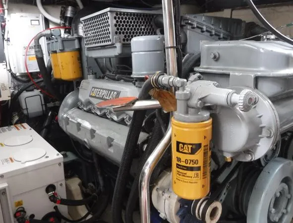  Yacht Photos Pics Engine room of 1997 Tiara Yachts 4000 Express with Caterpillar components.