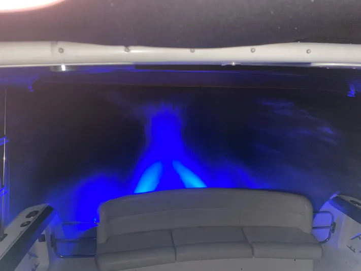  Yacht Photos Pics 1997 Tiara Yachts 4000 Express with blue underwater lights at night.