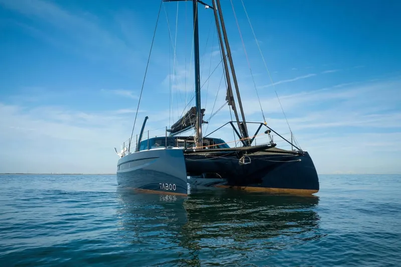 Hh52 New Sc Aft Yacht Photos Pics 2026 HH Catamarans HH52 sailing on calm blue waters under clear skies.