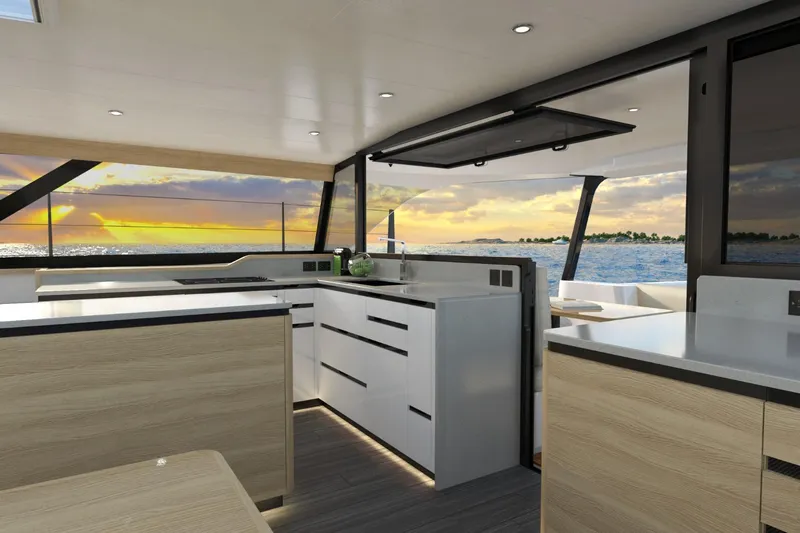 Hh52 New Sc Aft Yacht Photos Pics Modern interior of 2026 HH Catamarans HH52 with ocean view at sunset.