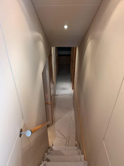  Yacht Photos Pics Interior hallway of a 2001 Hatteras 70 Convertible yacht.