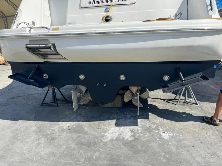 Pure Fun Yacht Photos Pics 2007 Sea Ray 40 Sundancer boat on dry dock, showing hull and propellers.