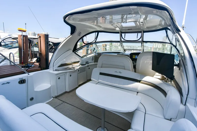 Pure Fun Yacht Photos Pics Luxurious 2007 Sea Ray 40 Sundancer yacht interior with elegant seating and modern amenities.